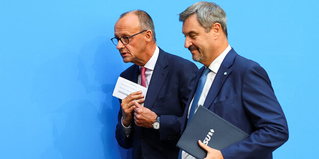 Friedrich Merz und Markus Söder gehen nebeneienander Friedrich Merz und Markus Söder gehen nebeneienander